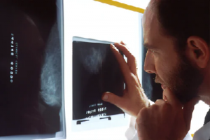 Sonographer looking at a scan 